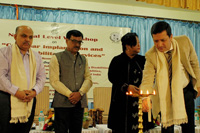 Shri Kausar Hilaly, Commissioner for Persons with Disabilities, Govt. of Assam lighting the lamp during the inaugural programme