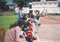 Our Children, spectators on sports day