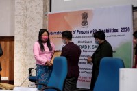 Shri. Kyrmen Shylla fecilitating Smt. Fryo Cheanchi M. Marak, a student with disabilities